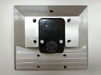Mounting Block – Front: Front face of mounting block with lock placement.
